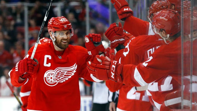 Red Wings left wing Henrik Zetterberg (40) celebrates his goal in the third period of the Wings' 3-1 win Wednesday at Joe Louis Arena.