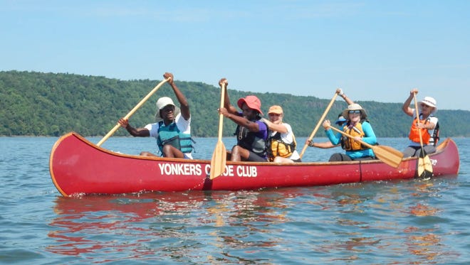 Members of the Yonkers Paddling & Rowing Club
