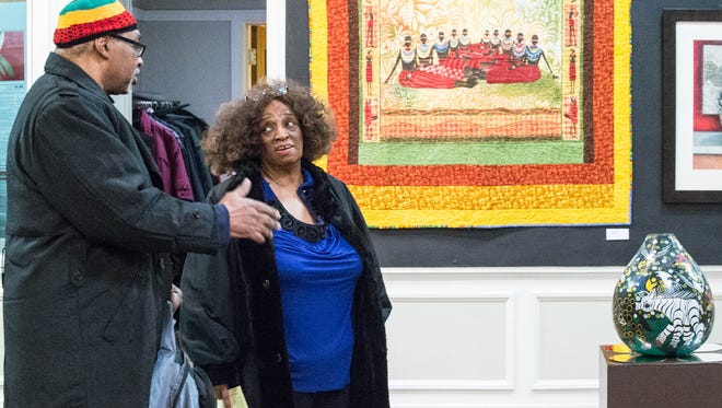 James Watkins and Selena Griffin at the opening reception for the "Art of Soul" exhibit at the Art Center of Battle Creek on Sunday.