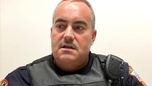 Franklin, Ohio, Police Officer Steve Dunham speaks, Tuesday, Aug. 16, 2016, in Franklin, Ohio. Dunham who bought a meal for a 7-year-old boy who authorities say was trying to sell a stuffed animal to buy food says calls praising him and even proposing marriage surprised him. Franklin police say they have been inundated with emails and phone calls praising Officer Steve Dunham’s actions.