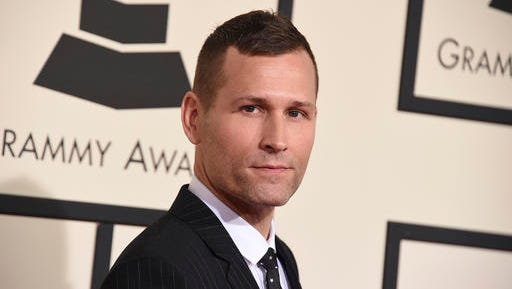FILE - In this Feb. 15, 2016 file photo, Kaskade arrives at the 58th annual Grammy Awards at the Staples Center in Los Angeles.  The Grammy-nominated DJ and producer has seen the headlines proclaiming the beginning of the end of the electronic dance music craze, but he’s not buying it.  “I don't think that at all, obviously. I'm busier than I ever have been and I think, really, we just kind of scratched the surface,” he said in a recent interview.