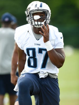 Titans tight end Jonnu Smith warms up before the start of minicamp June 14, 2017.