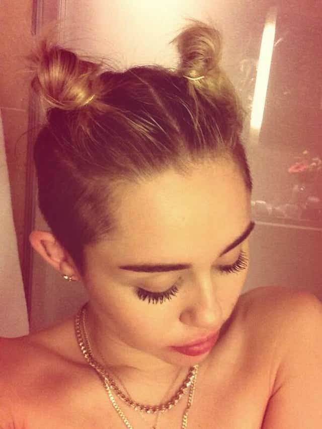 Miley Cyrus Shares Shower Selfie Her shoulders were bare and her face on november 10, miley shared another provocative picture of herself right out of the shower, looking down with exposed shoulders and her hair done up. miley cyrus shares shower selfie