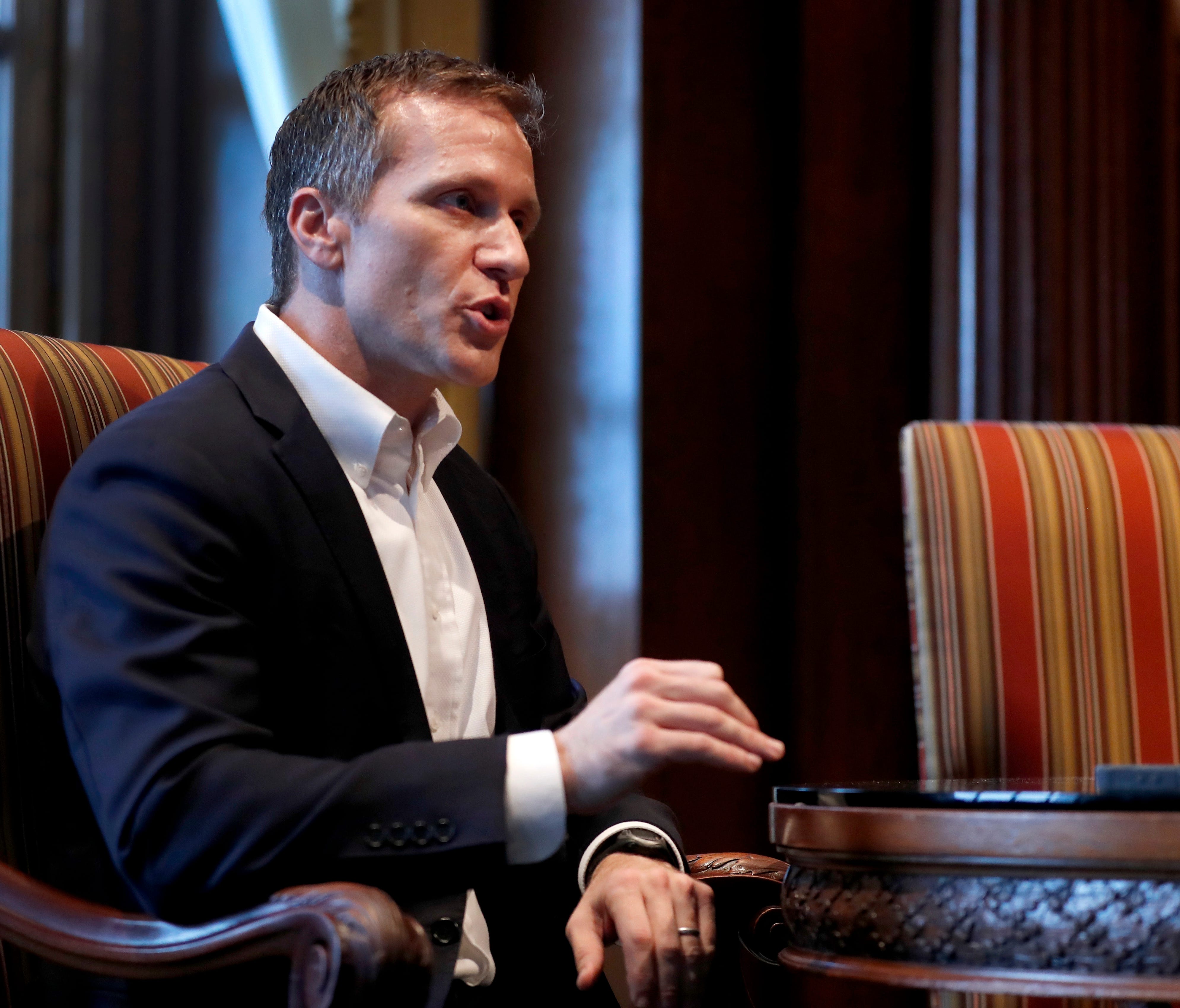 Missouri Gov. Eric Greitens speaks during an interview in his office at the Missouri Capitol Saturday, Jan. 20, 2018, in Jefferson City, Mo. Greitens discussed having an extramarital affair in 2015 before taking office. (AP Photo/Jeff Roberson)