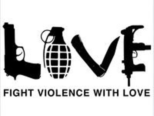 Download The artist behind gun T-shirt says both sides in Wisconsin ...