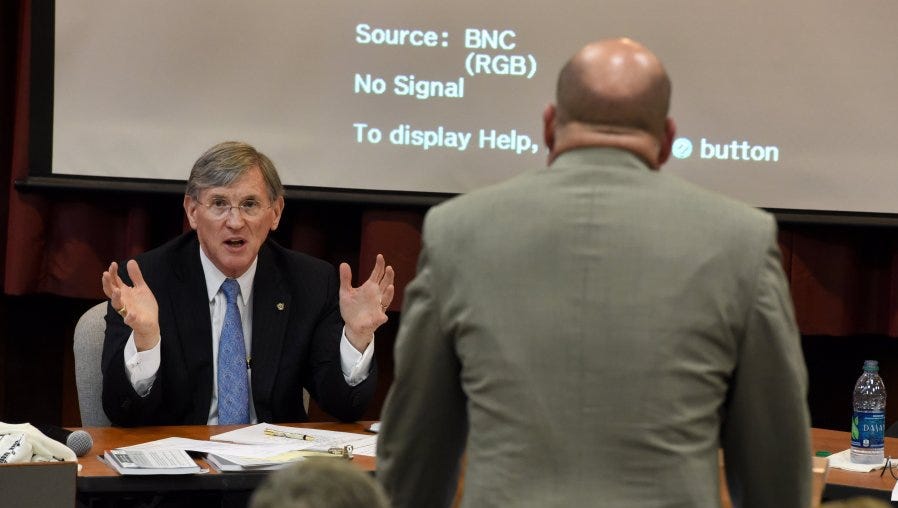 Tennessee Supreme Court Indigent Representation Task Force member Dean William Koch questions Sevier County Public Defender Ed Miller at the University of Tennessee College of Law in 2016.