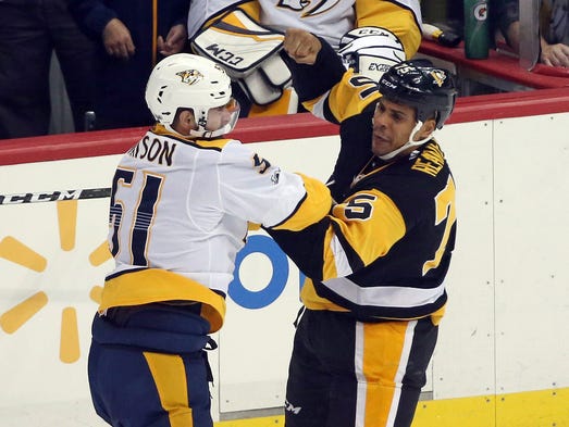 Nashville Predators left wing Austin Watson (51) and