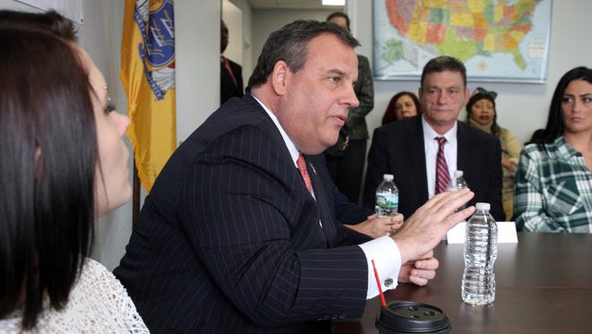 Gov. Chris Christie participates in a roundtable discussion with clients and staff at Preferred Behavioral Health in Toms River Wednesday, the day after his State of the State address that highlighted addiction treatment and recovery programs.