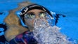Maya Dirado swims during the women's 200-meter backstroke