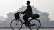 A man cycles past the Kim Il Sung square on Wednesday,