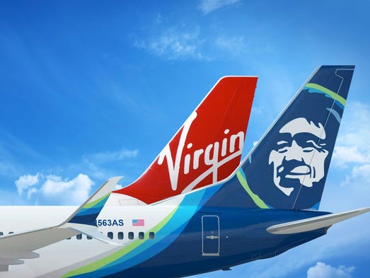 An image showing the tails of Alaska Airlines and Virgin