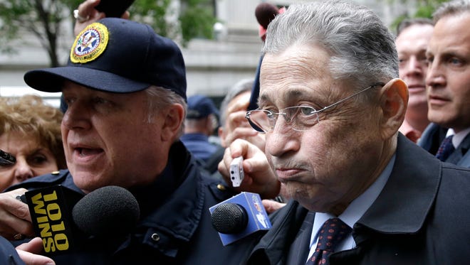 Former Assembly Speaker Sheldon Silver leaves court surrounded by reporters in New York, Tuesday, May 3, 2016.