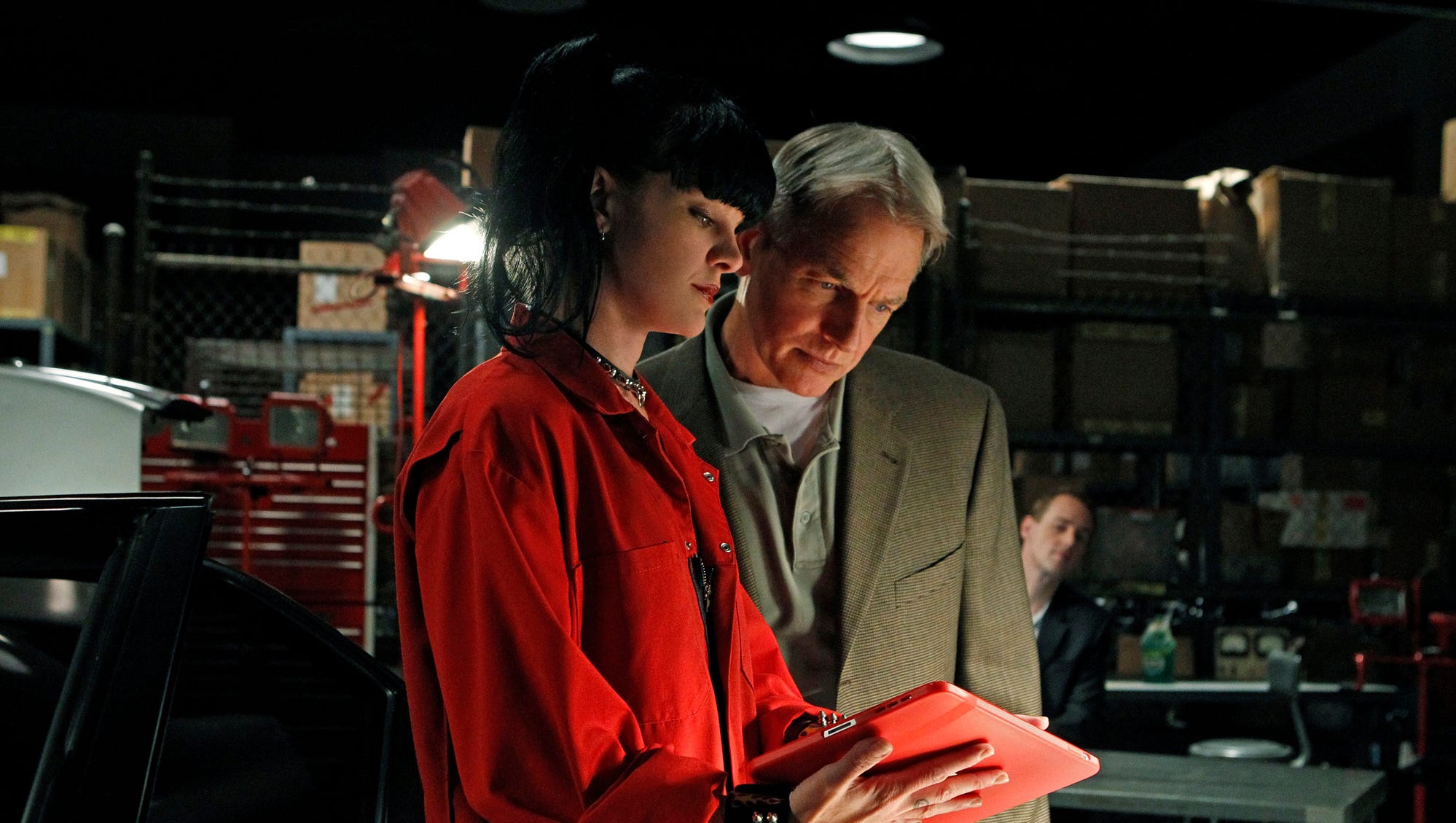 Abby (Pauley Perrette) shares information with NCIS boss Gibbs (Mark Harmon) in a 2010 episode.