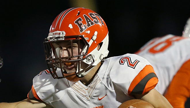 FILE – Columbus East QB Josh Major led the Olympians to the 2017 IHSAA Class 5A state title on Friday.
