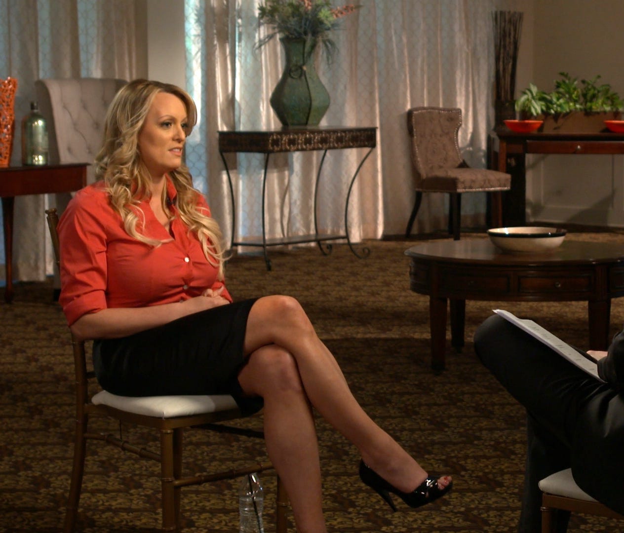 This image released by CBS News shows Stormy Daniels, left, during an interview with Anderson Cooper, scheduled to air Sunday on 