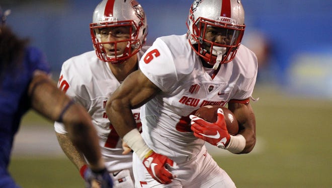 New Mexico Lobos running back Jhurell Pressley (6) runs the ball against the San Jose State Spartans in a game earlier this season.