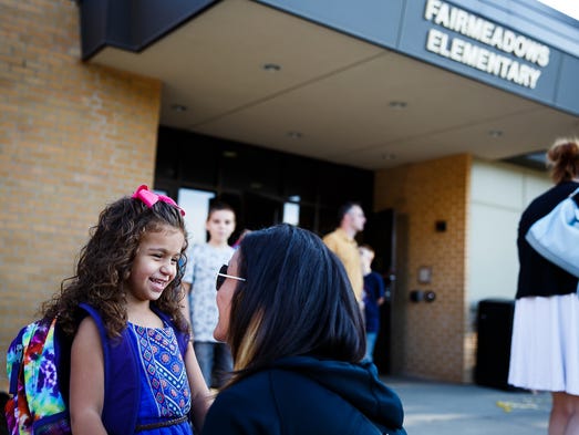 Isabella Anderson, 5, says goodbye to her mother Sam,
