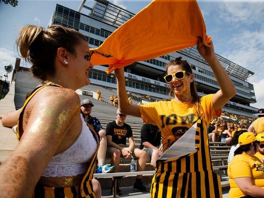 Maggie Voss, a freshman from Washington, IA, fans Kiaya