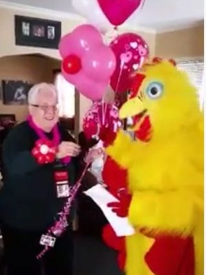 Balloon Squad USA delivers a baloon bouquet and singing telegram to Bonnie Youngerman from her daughter Cindi Williams of Huron.