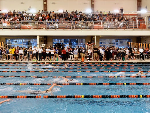 West York's Courtney Harnish, far right, swims the