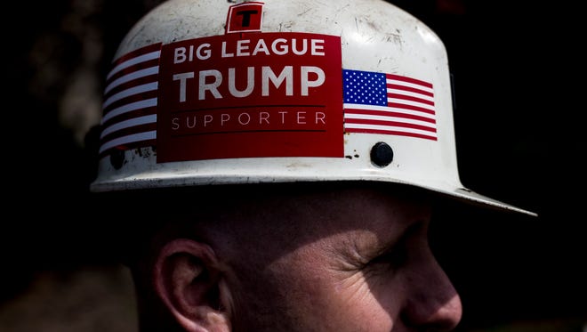 Paul Miracle, a Kentucky coal miner, waits in line before the arrival of Pres. Donald Trump to the Kentucky Exposition Center's Freedom Hall on Monday. March 20, 2017