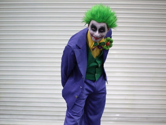 A visitor to the London Super Comic Convention wears