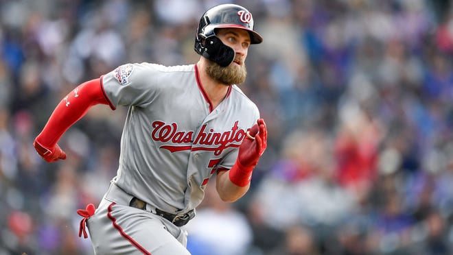 A person familiar with the negotiations tells the Associated Press that Bryce Harper and the Philadelphia Phillies have agreed to a $330 million, 13-year contract, the largest deal in baseball history.