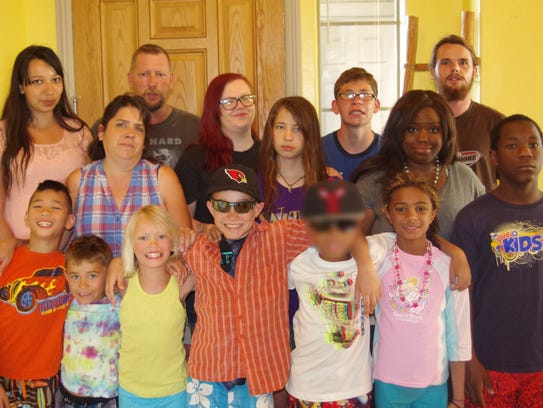 The Charlebois family has fostered and/or adopted 35