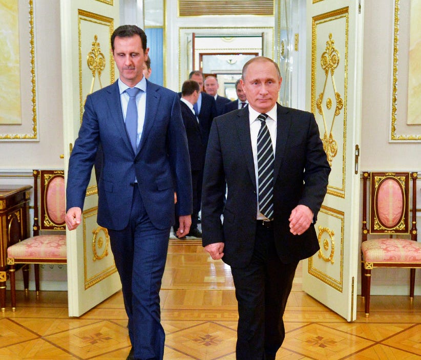 Russian President Vladimir Putin, right, and Syria President Bashar Assad.