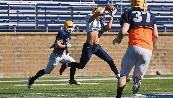 Augustana wide receiver Matt Heller (19) catches a pass during Spring football practice Wednesday, April 13, 2016, at Kirkeby-Over Stadium in Sioux Falls. 