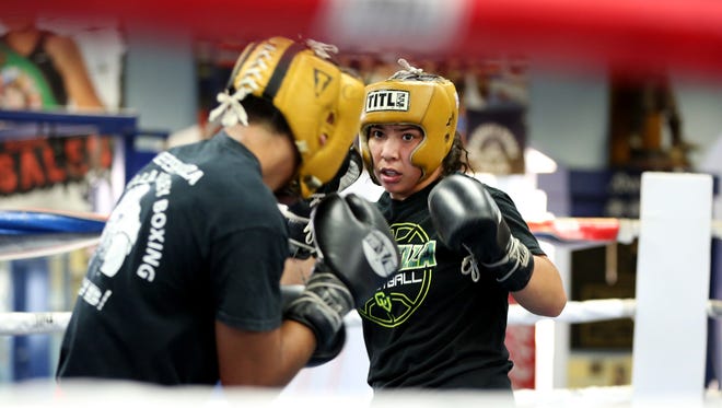 Citlalli Ortiz and Rene Flores practice in the ring at the Coachella Valley Boxing Club.