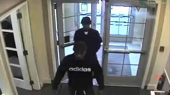 A photo of two suspects sought in the bank robbery of the Canandaigua National Bank branch on Alexander Street on Dec. 13, 2016.