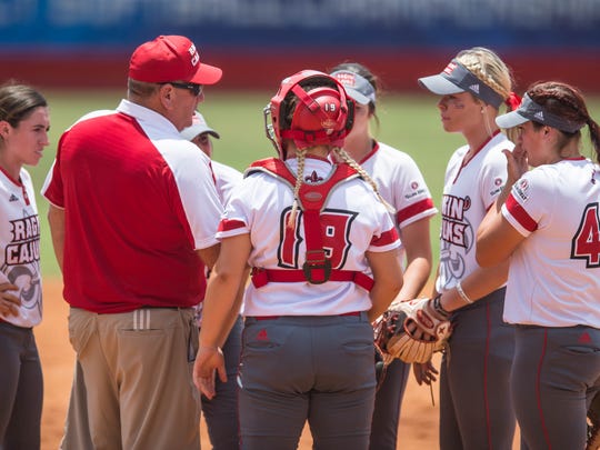 Head coach Gerry Glasco talks to his team after having