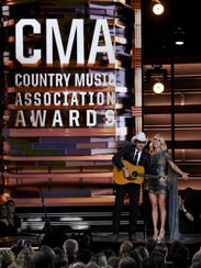 Co-hosts Brad Paisley and Carrie Underwood during their