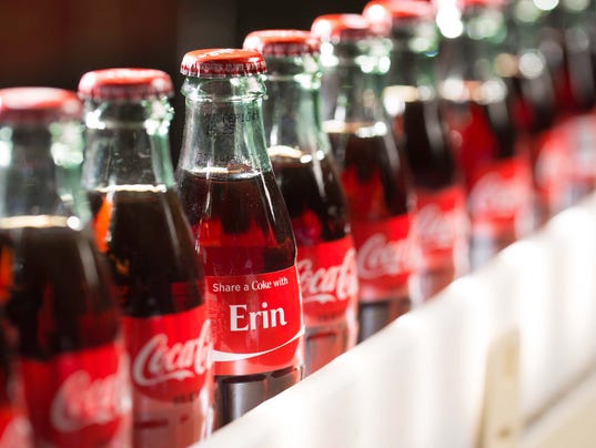 Coke Bottles With First Names Return the-history-of-the-coca-cola-logo-web-design-ledger