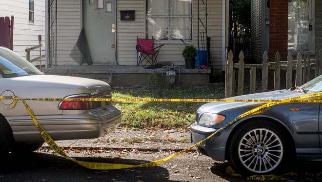 Crime scene tape blocks off the scene of a double homicide that took place Monday night, Oct. 30 at 213 E. Maryland Street in Evansville. According to a release from the Vanderburgh County Coroner's office, Dewone Broomfield, 29, and Mary Patrice Chalonda Woodruff, 28, were the victims in the slaying that the Evansville Police department is currently investigating. 