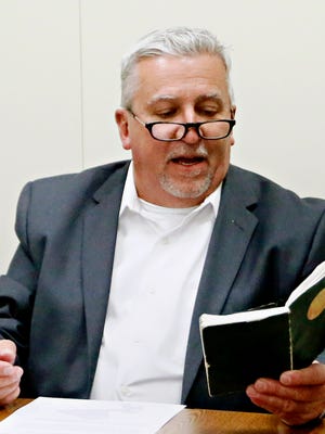 State Sen. Mike Folmer reads Article 1, Section 2 of the United States Constitution while speaking with the York Dispatch Editorial Board at the office in West Manchester Township, Tuesday, Dec. 13, 2016. Dawn J. Sagert photo