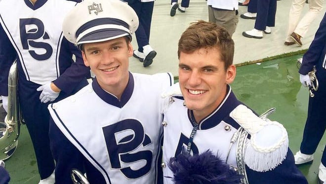 Brothers Jack, left, and Jimmy Frisbie are both members of the Penn State Blue Band. Jack was just named drum major, succeeding Jimmy in that role.