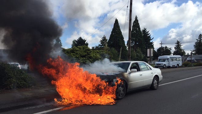A car fire blocked lanes on Silverton Road Friday morning.