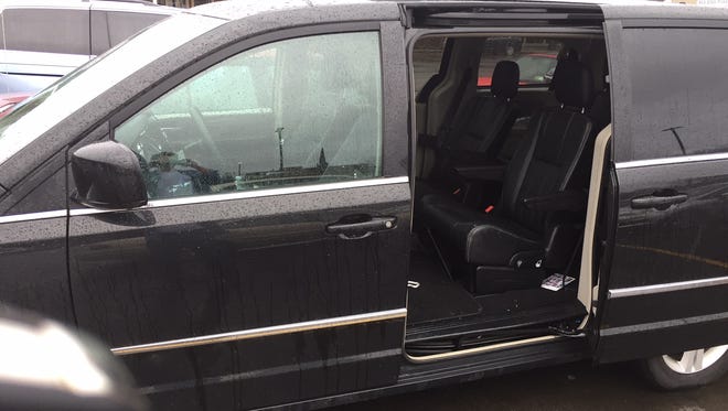 Columnist David Andreatta's minivan. The door was mistakenly left open in the pouring rain.