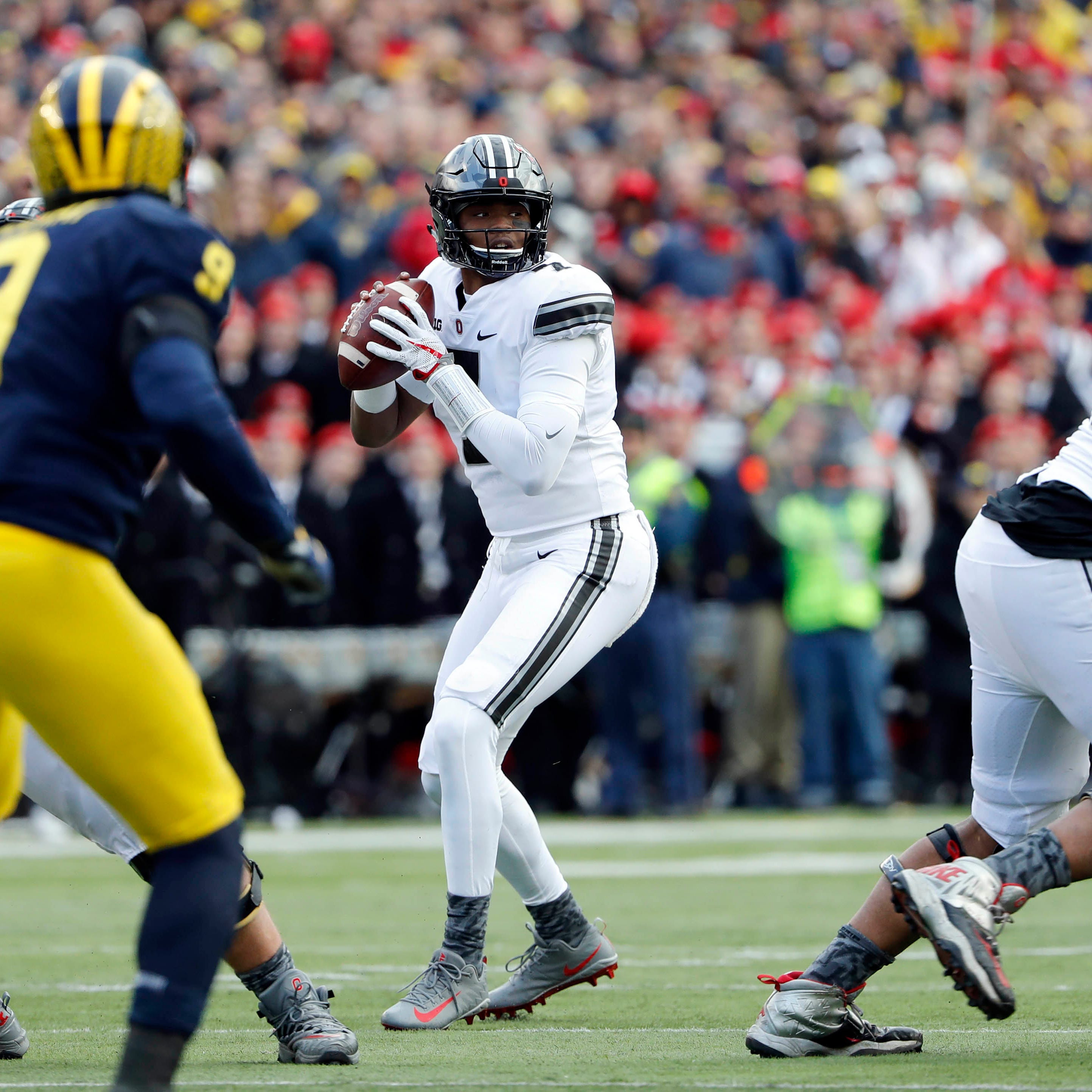 Ohio State quarterback Dwayne Haskins drops back to pass during the second half against Michigan.