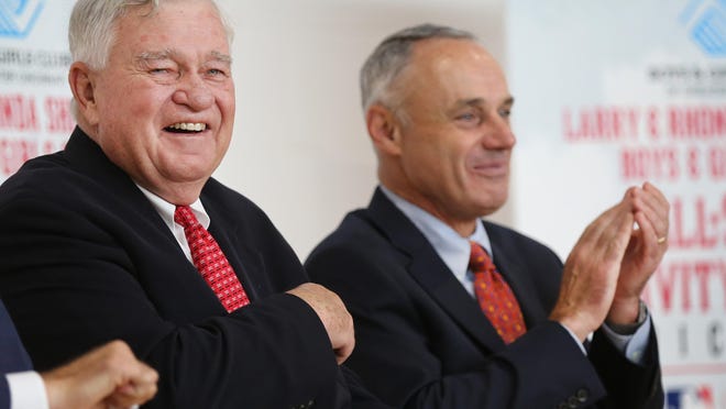 Bob Castellini, left, president and CEO of the Cincinnati Reds, and MLB Baseball Commissioner Rob Manfred.