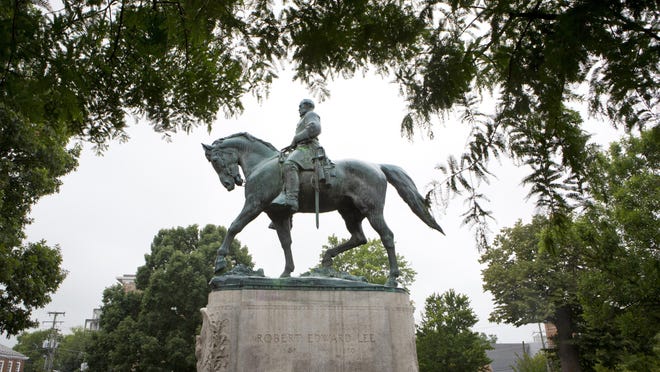 The statue of Confederate general Robert E. Lee still sits in Emancipation Park in Charlottesville, Va. The rally by white nationalists in Charlottesville last month has accelerated the removal of Confederate statues in cities across the nation.