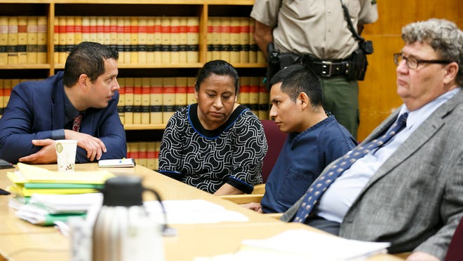 Raul Xalamihau-Espindola listens to translators at a sentencing hearing on Monday, June 6, 2016. He was sentenced to 22 years and 11 months in prison after being found guilty of three counts of first-degree rape. Two translators worked with Xalamihau-Espindola, one translating English to Spanish and the other translating Spanish to Nahuatl, a Central Mexican language also known as Aztec. 