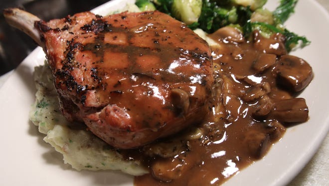 Salt Creek Grille's signature pork chop is an option on the Rumson restaurant's Thanksgiving menu.