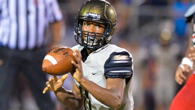 Northwest Rankin quarterback Braden Smith (11) and the Cougars fell to Warren Central Friday night in Vicksburg.