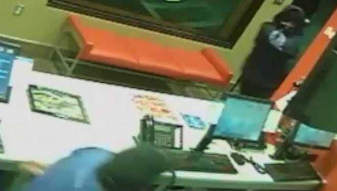 On Aug. 20 two armed men robbed the Domino's pizza shop on Palm Beach Boulevard.