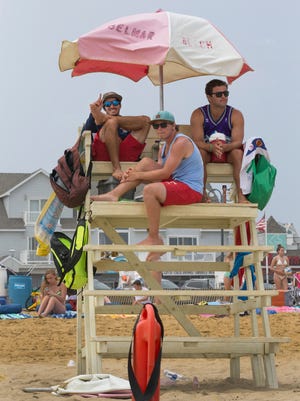 Guarding in Belmar near 17th Ave are Mark Cenicola, Conor Cummingham, and Joe Tashjy during the heat of the afternoon. 