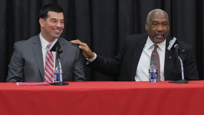 Ohio State athletic director Gene Smith, right, and football coach Ryan Day at a news conference in December 2018 announcing Day's hiring as coach.