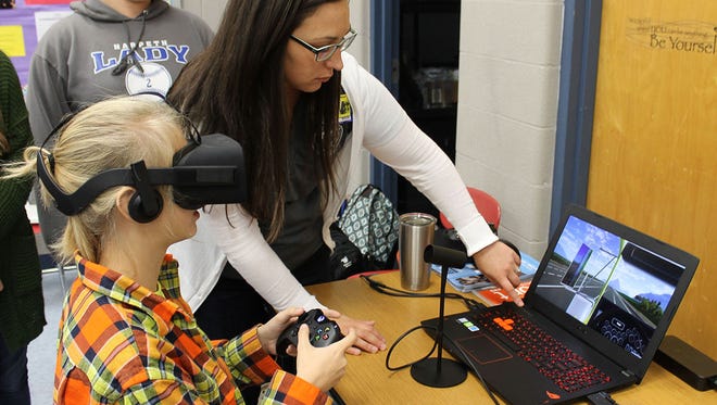 Harpeth High School recently observed Virtual Reality Day. Students were able to experience real-life scenarios, like driving under the influence and building a car using lightweight metals, in a game world known as virtual reality.
